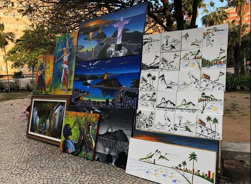 Photo of Christ the Redeemer statue paintings at Feira Hippie de Ipanema