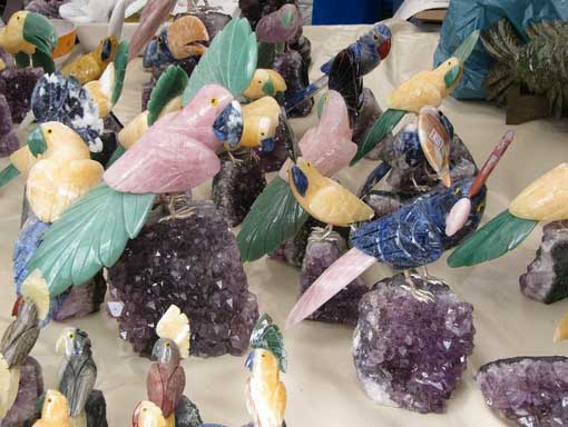 Photo of hand-carved gemstone birds at Feira Hippie de Ipanema